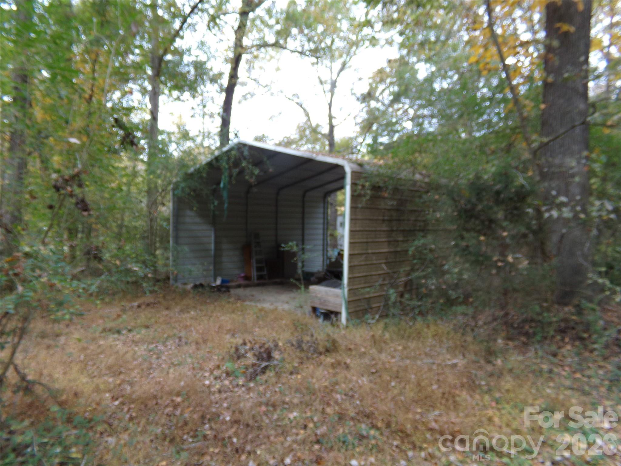 627 Bolick Road Fort Mill, SC 29707 - Photo 20 of 20 a view of a large tree in the back yard