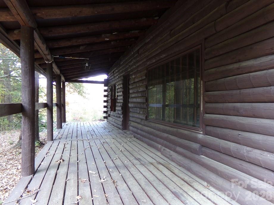 627 Bolick Road Fort Mill, SC 29707 - Photo 8 of 20 a view of backyard with wooden floor and outdoor seating