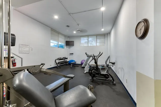 a view of a room with gym equipment