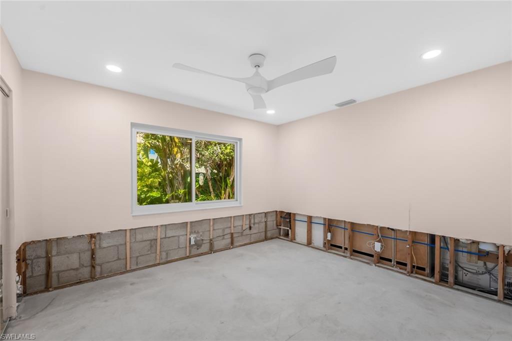 24 Rivard Road, Unit 12 Naples, FL 34112 - Photo 18 of 27 Spare room with ceiling fan