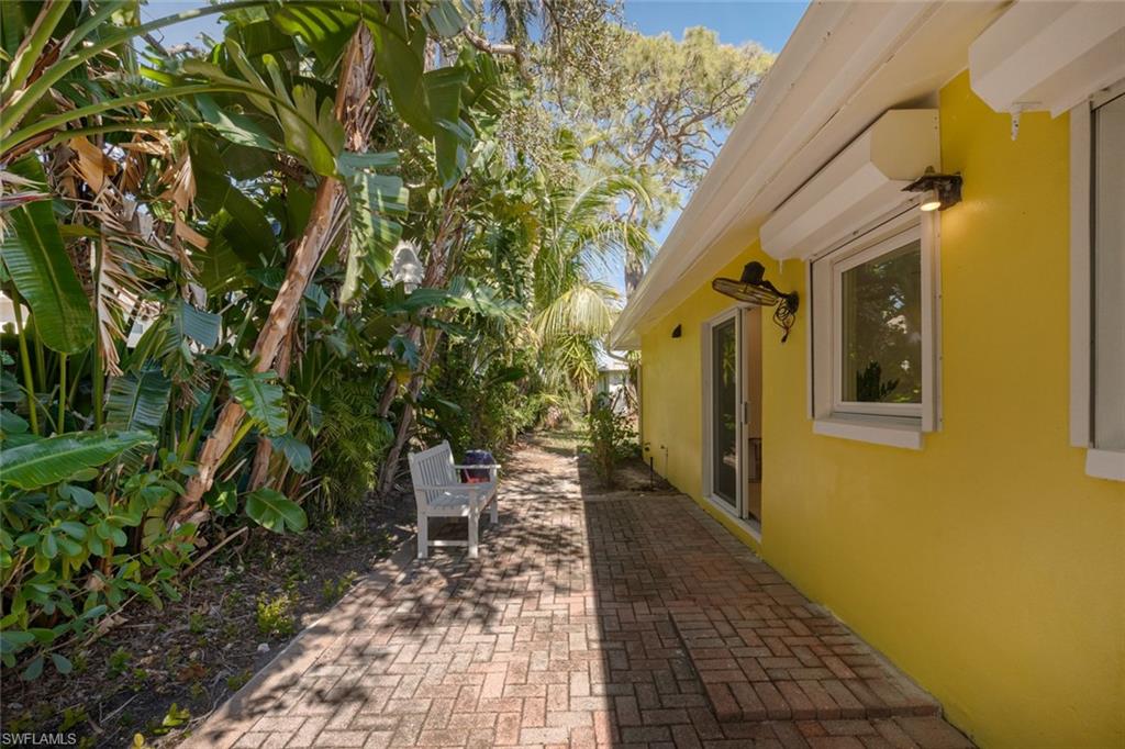 24 Rivard Road, Unit 12 Naples, FL 34112 - Photo 24 of 27 View of home's exterior with a patio