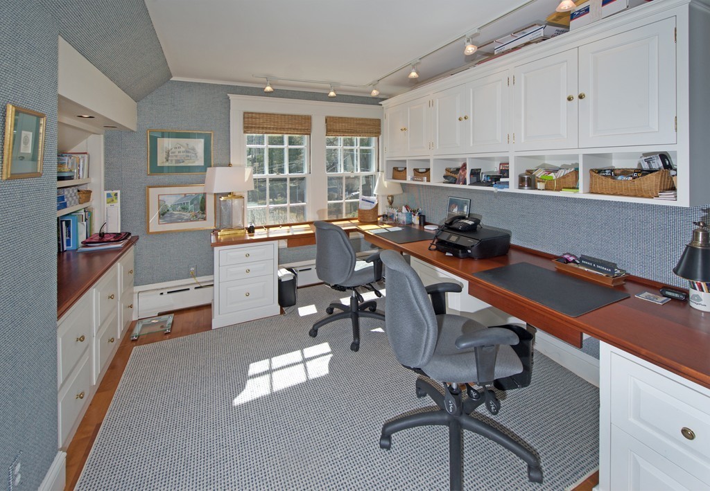 17 Bradlee Road Marblehead, MA 01945 - Photo 16 of 28 a room with stainless steel appliances kitchen island granite countertop a refrigerator and a stove top oven