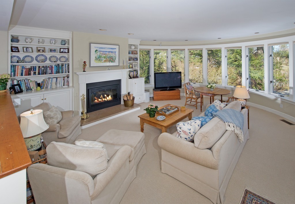 17 Bradlee Road Marblehead, MA 01945 - Photo 7 of 28 a living room with furniture and a fireplace