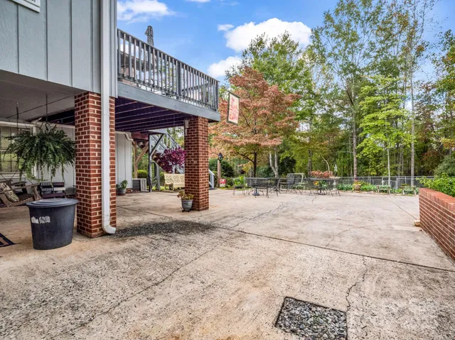 a view of a backyard with a patio