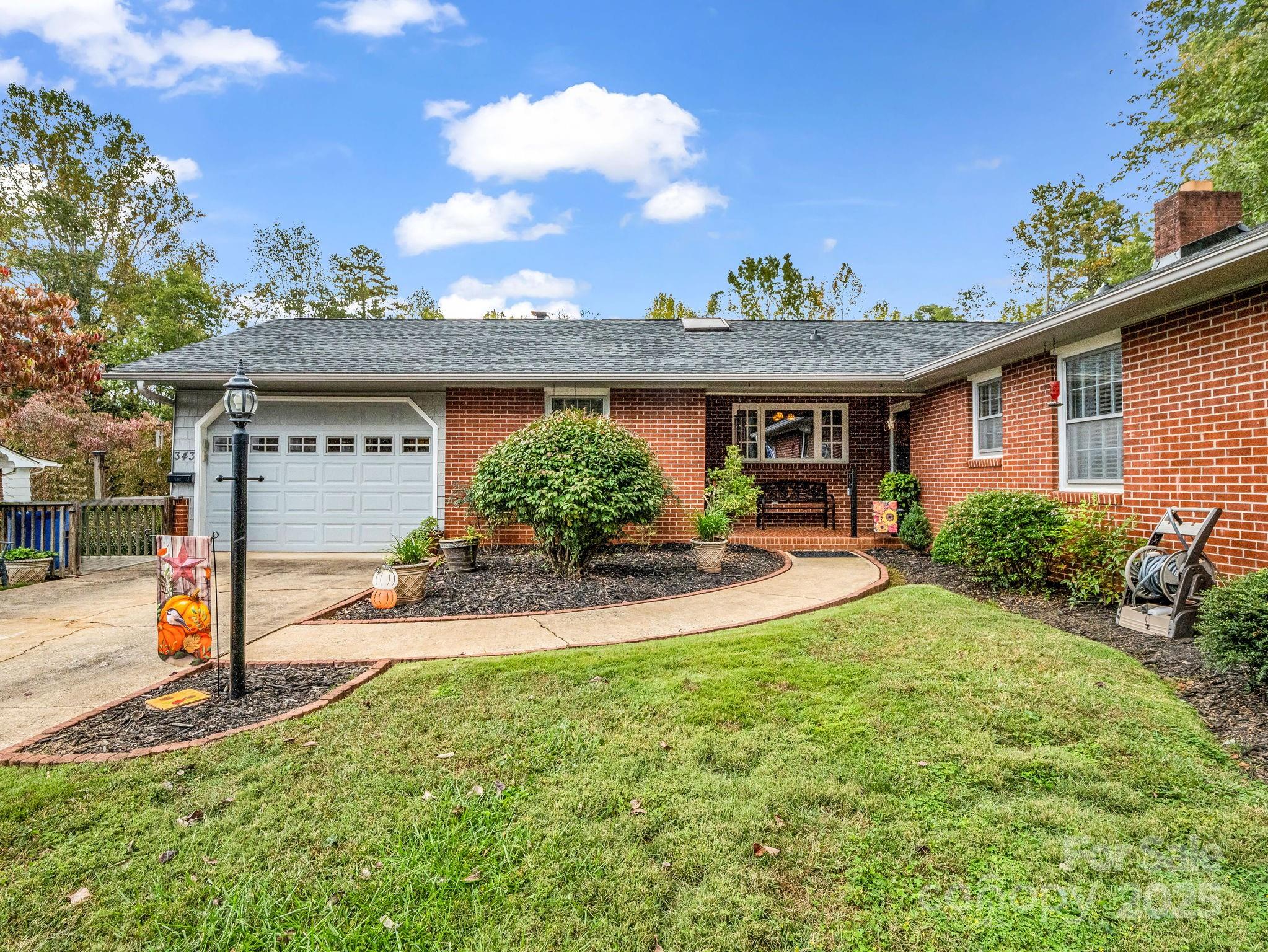 343 Nebraska Street Spindale, NC 28160 - Photo 14 of 46 a view of a backyard with a patio