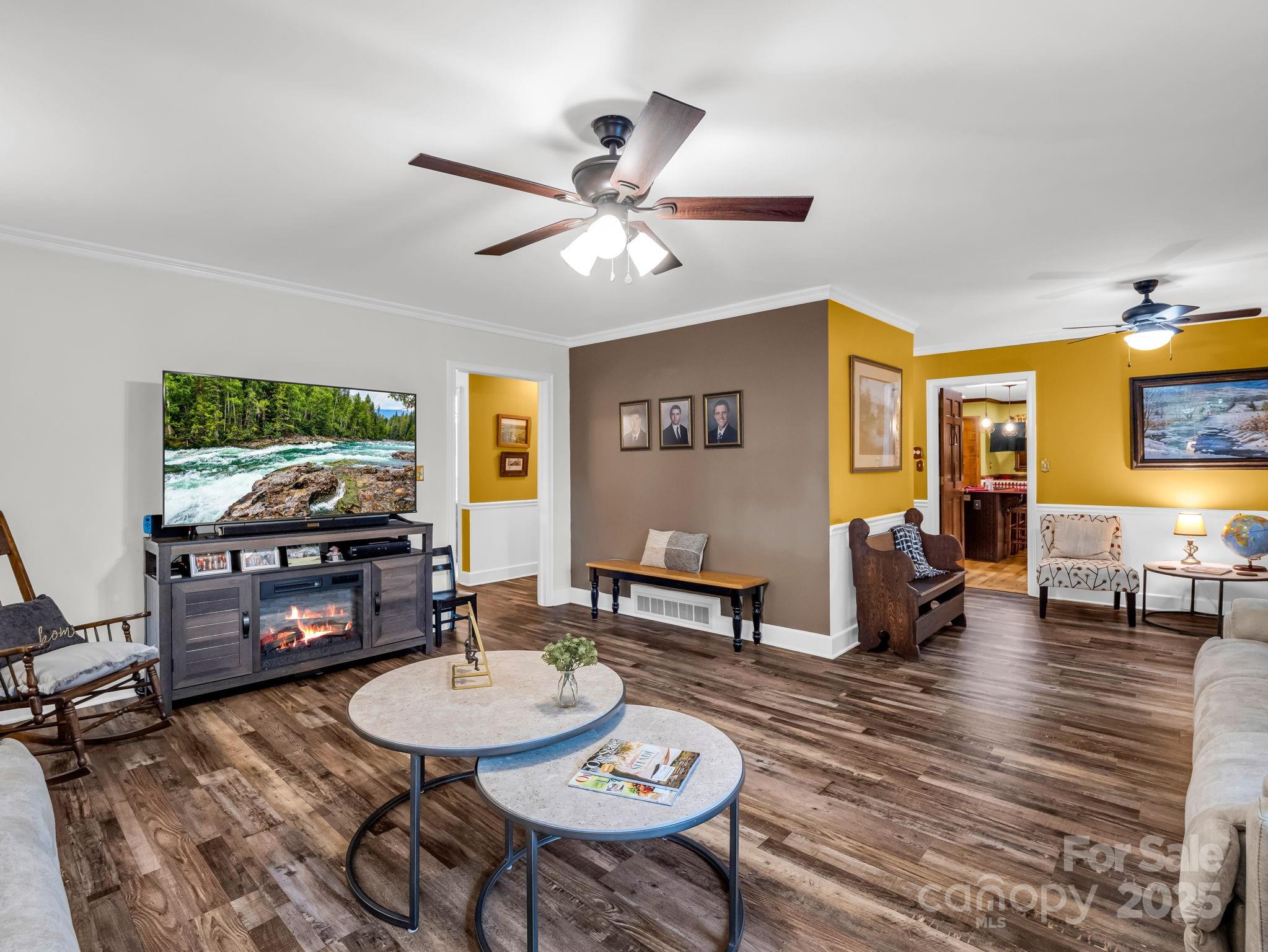 343 Nebraska Street Spindale, NC 28160 - Photo 17 of 46 a living room with furniture and a wooden floor