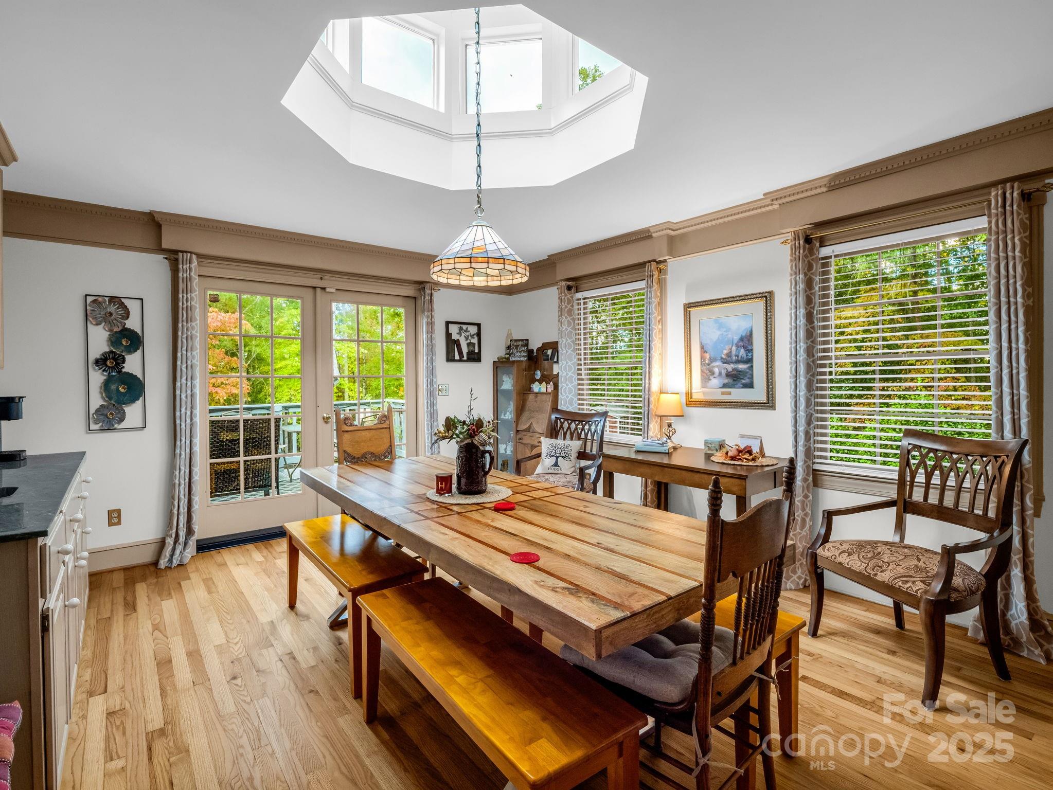 343 Nebraska Street Spindale, NC 28160 - Photo 21 of 46 a view of a dining room with furniture window and wooden floor