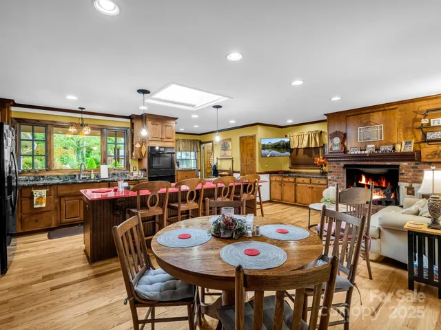 a view of a dining room with furniture and window