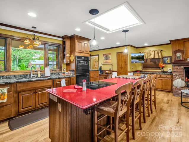 a dinning room with a table and chairs