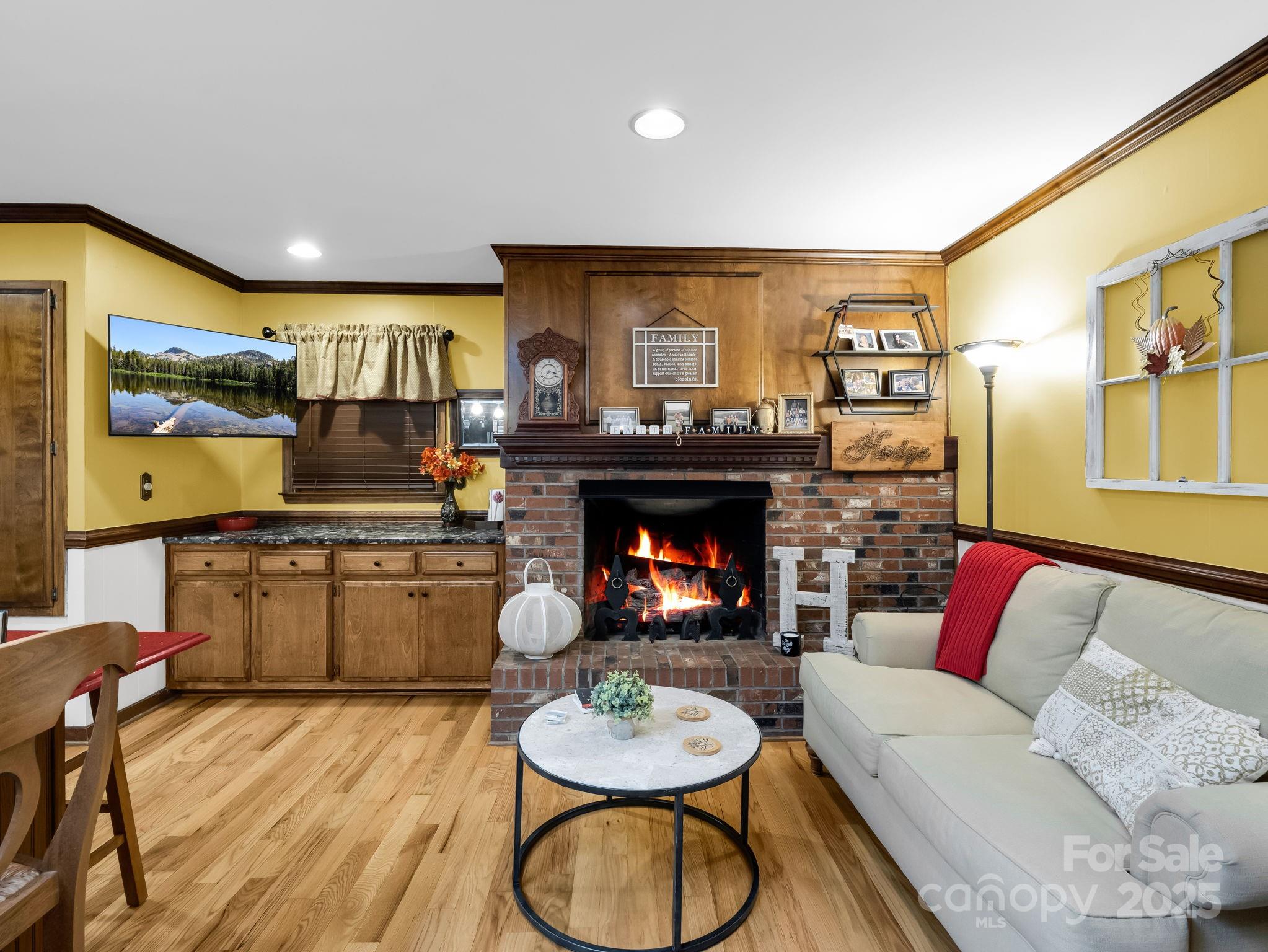 343 Nebraska Street Spindale, NC 28160 - Photo 32 of 46 a living room with furniture and a fireplace