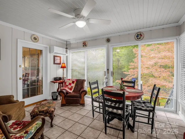 a view of a balcony with chairs