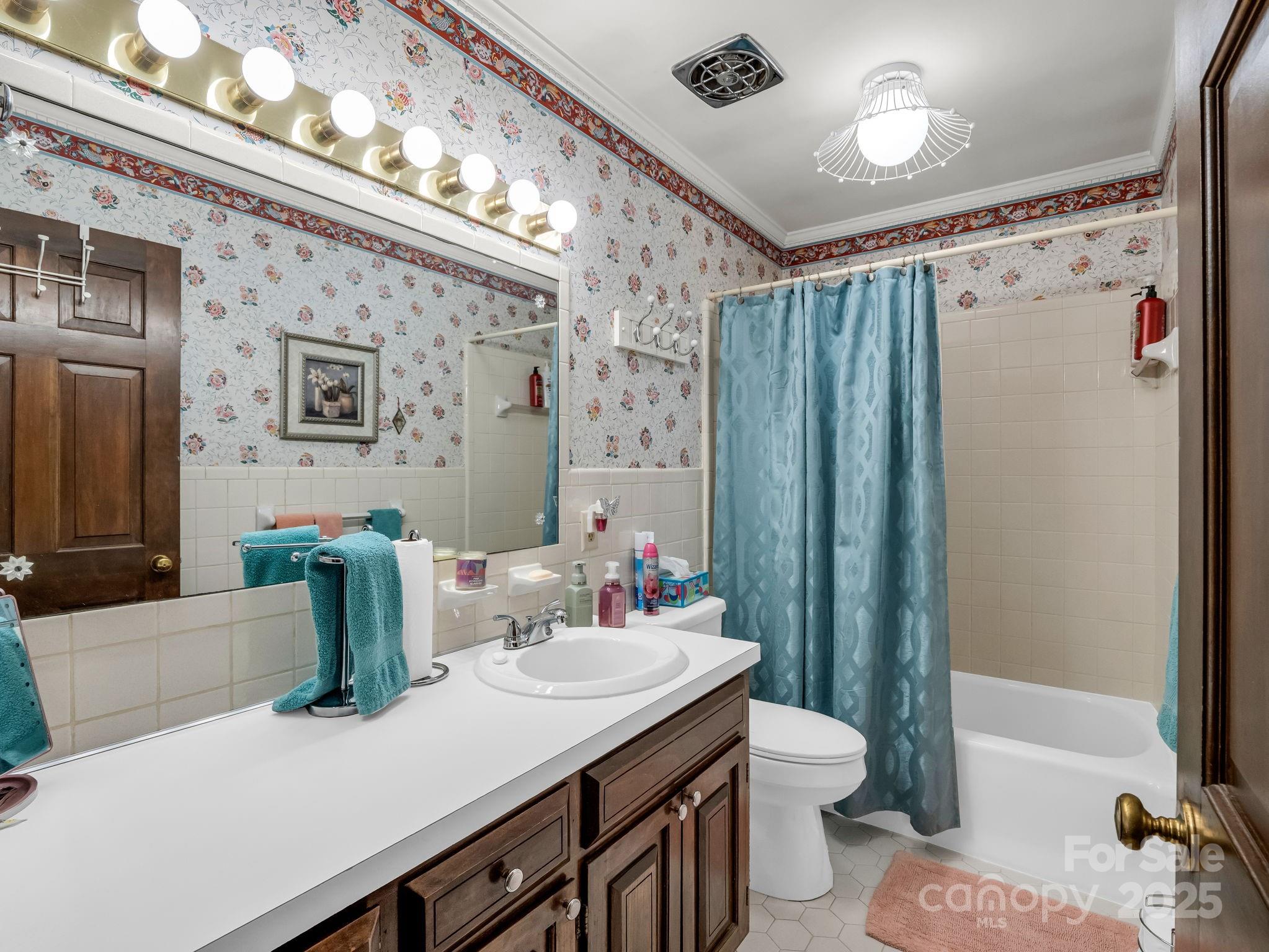 343 Nebraska Street Spindale, NC 28160 - Photo 37 of 46 a bathroom with a sink a toilet and shower