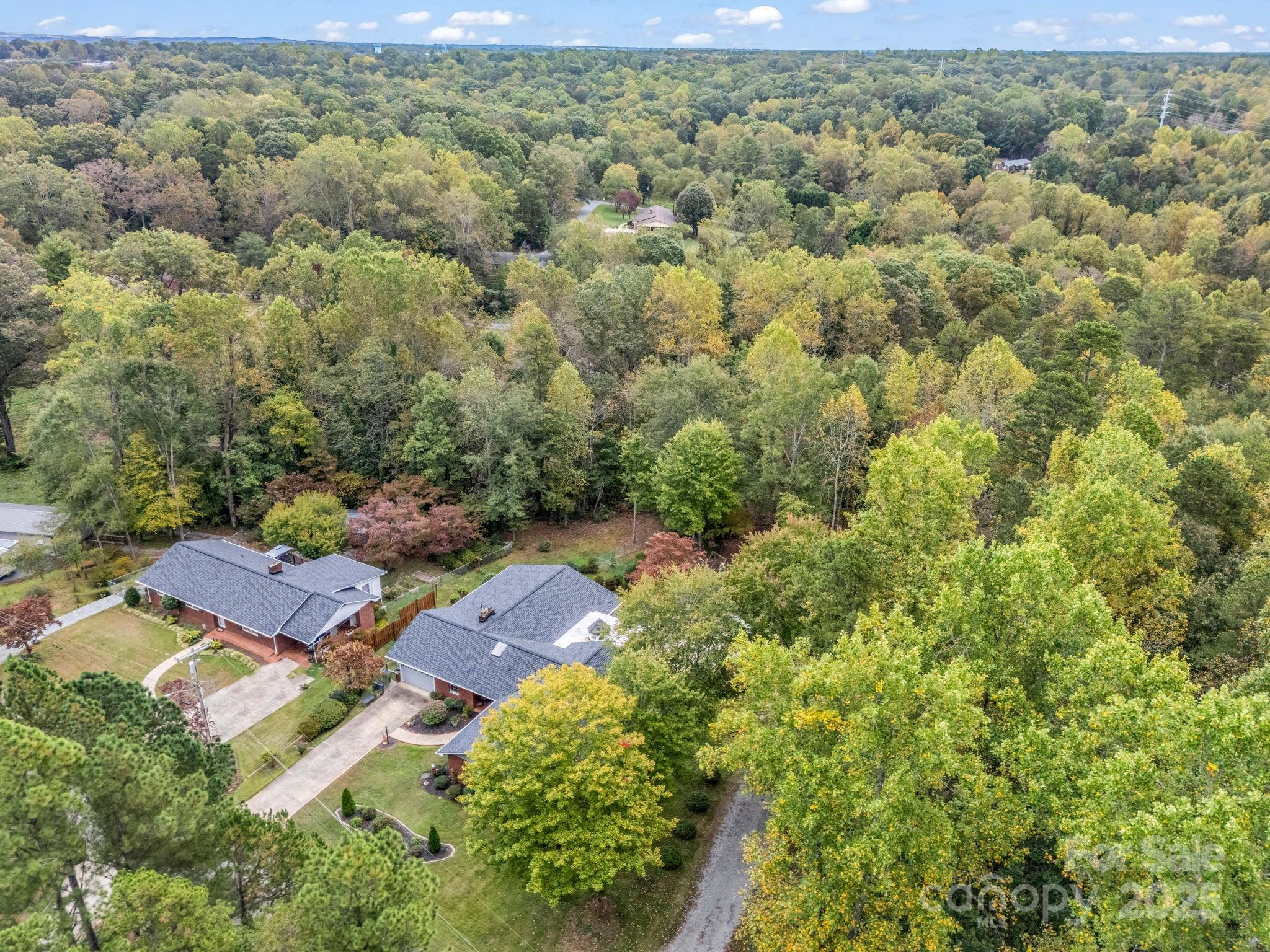 343 Nebraska Street Spindale, NC 28160 - Photo 46 of 46 an aerial view of residential houses with outdoor space and trees