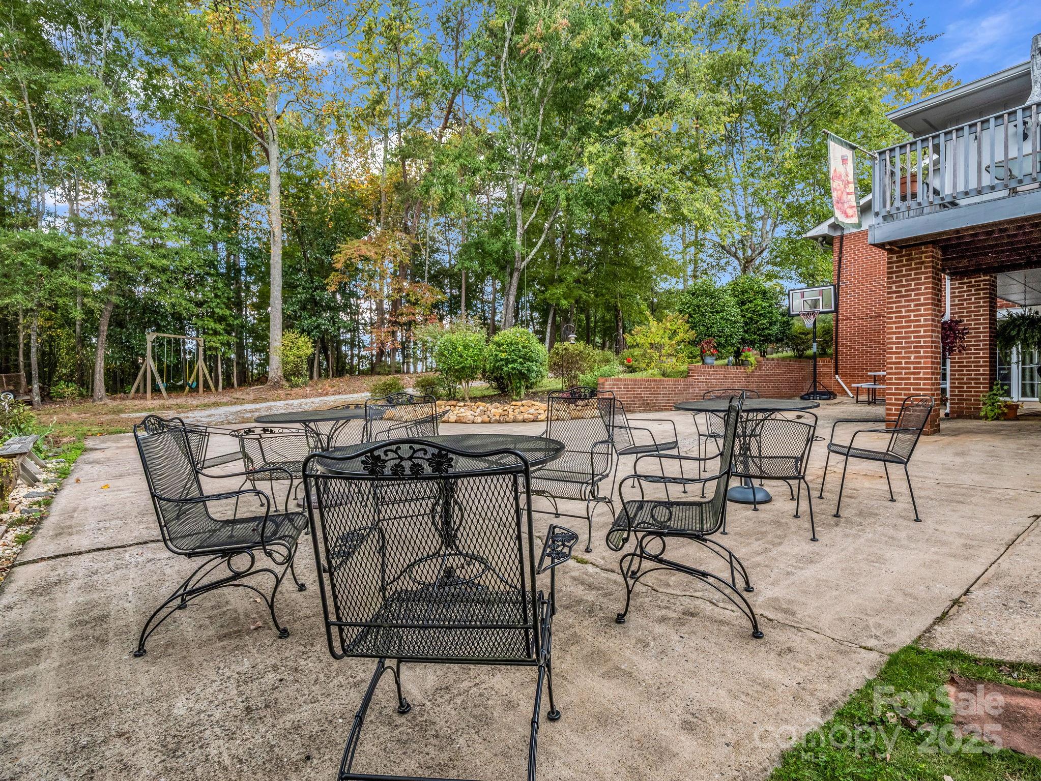 343 Nebraska Street Spindale, NC 28160 - Photo 10 of 46 a view of a chairs and table in the patio