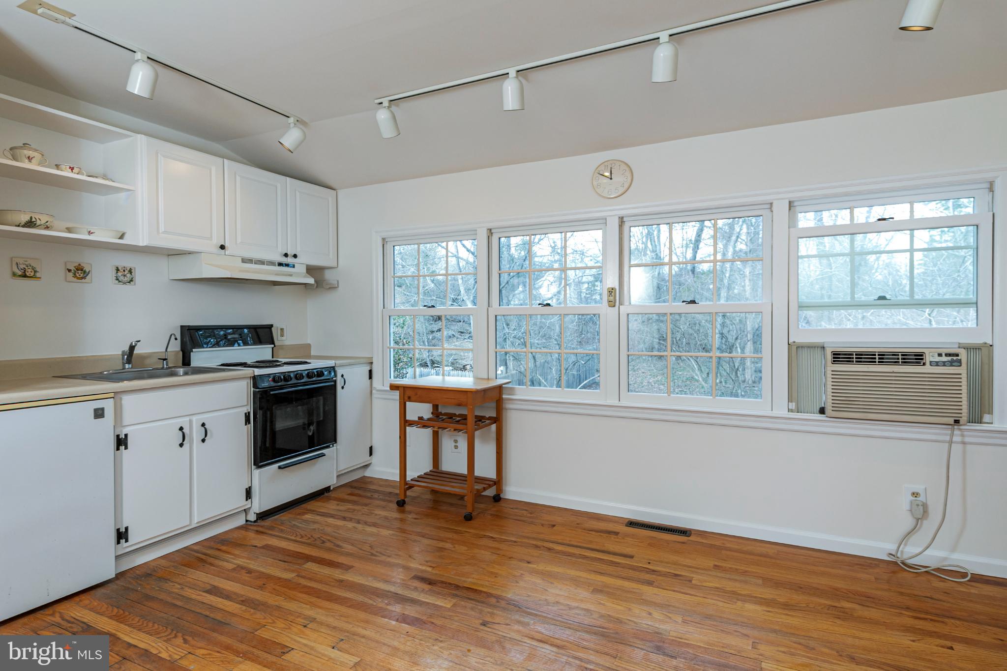 607 Rosedale Road Princeton, NJ 08540 - Photo 6 of 12 a kitchen with granite countertop a stove a sink and a refrigerator