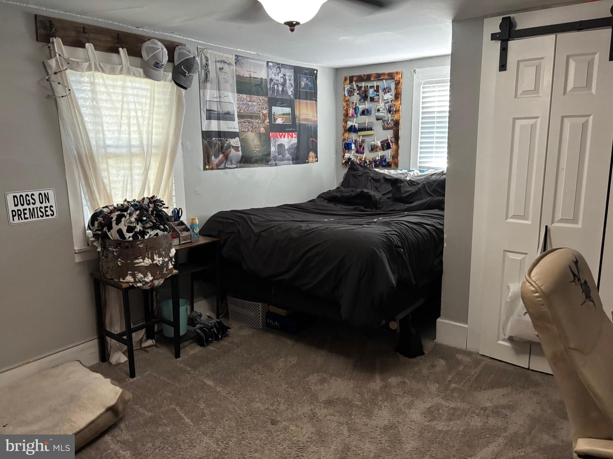 70 Main Street Waretown, NJ 08758 - Photo 40 of 55 a bedroom with a bed and a window