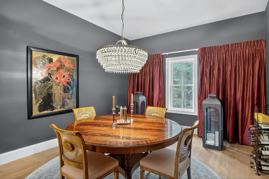 280 Ice Valley Road Osterville, MA 02655 - Photo 24 of 42 a dining room with furniture a chandelier and window