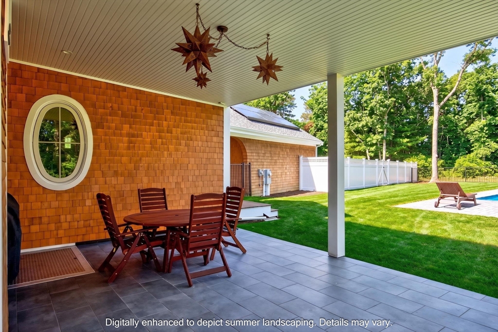 280 Ice Valley Road Osterville, MA 02655 - Photo 41 of 42 a view of a house with garden and a patio