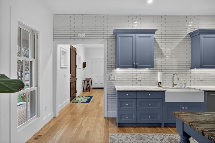 280 Ice Valley Road Osterville, MA 02655 - Photo 8 of 42 a spacious bathroom with a granite countertop sink and a mirror