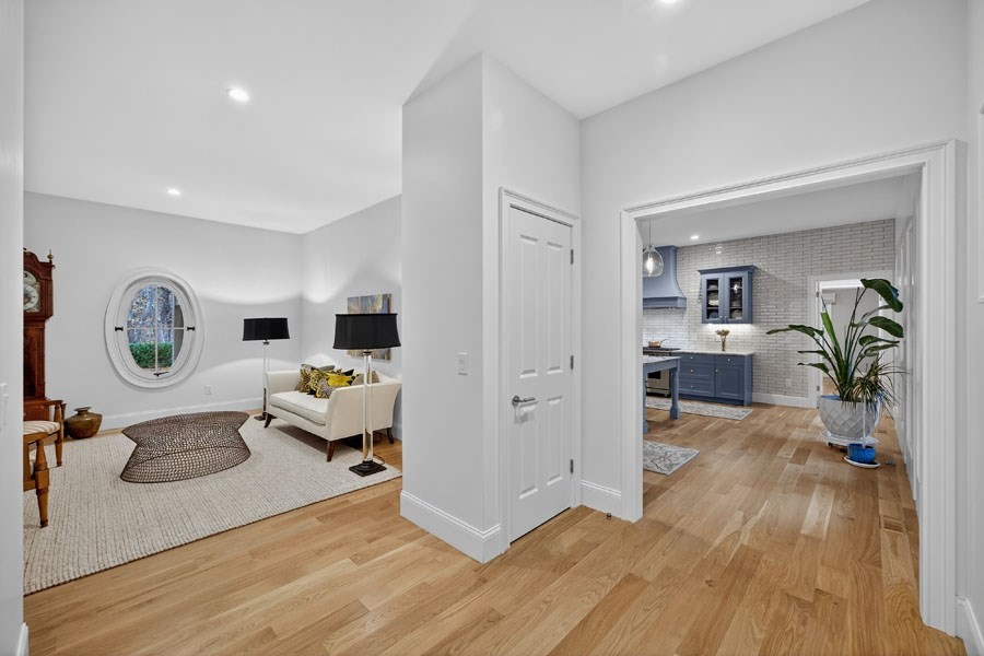 280 Ice Valley Road Osterville, MA 02655 - Photo 9 of 42 a living room with furniture and a wooden floor