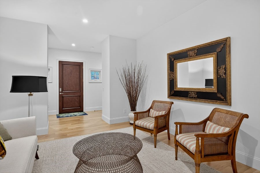 280 Ice Valley Road Osterville, MA 02655 - Photo 10 of 42 a living room with furniture and a flat screen tv
