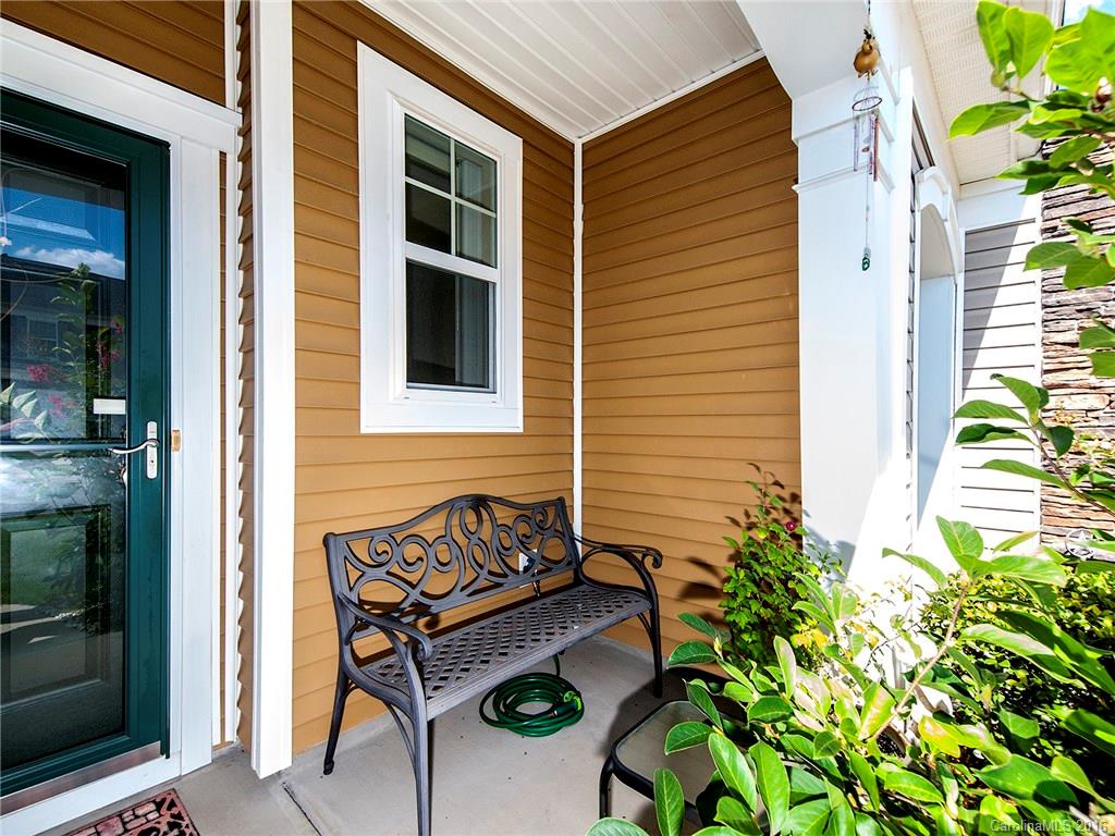 264 River Clay Road, Unit 211 Fort Mill, SC 29708 - Photo 2 of 23 a backyard of a house with outdoor seating