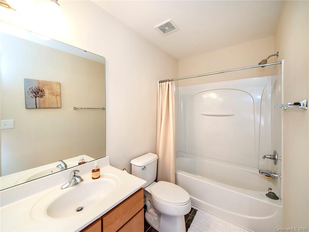 264 River Clay Road, Unit 211 Fort Mill, SC 29708 - Photo 11 of 23 a bathroom with a sink mirror toilet and bathtub