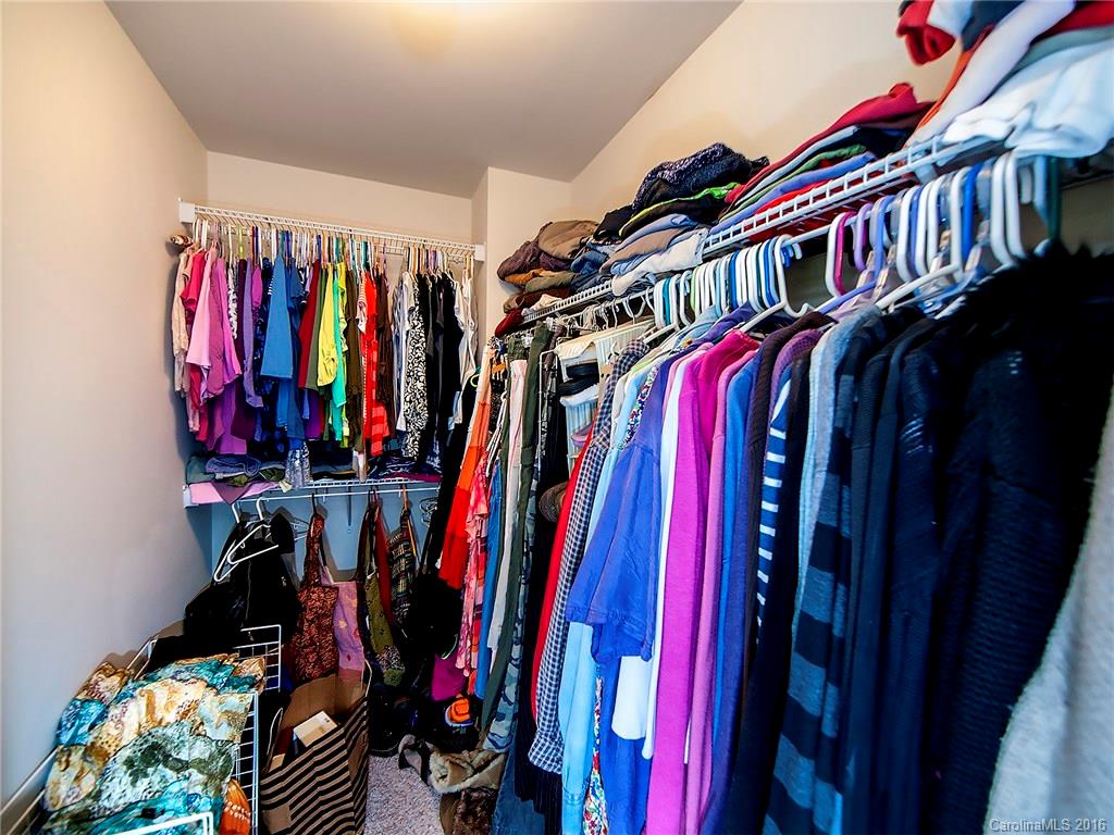 264 River Clay Road, Unit 211 Fort Mill, SC 29708 - Photo 16 of 23 a view of walk in closet with clothes and shoes