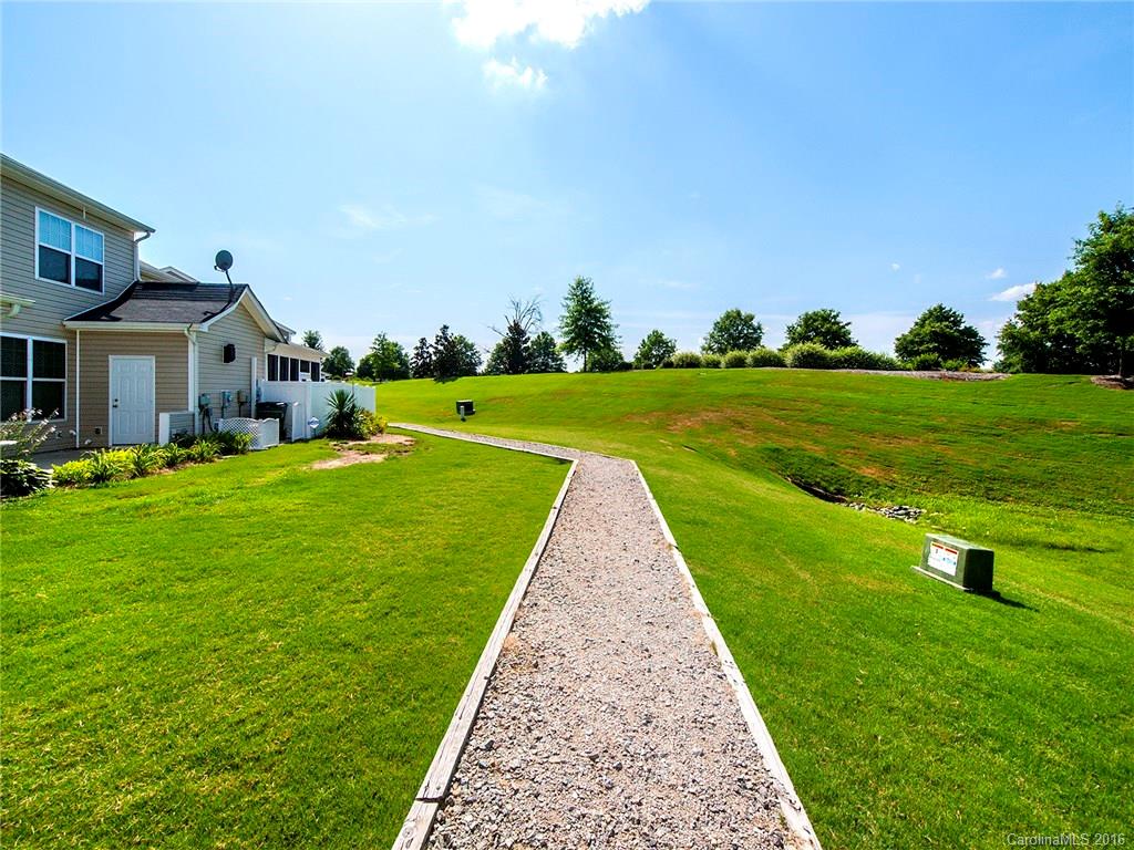 264 River Clay Road, Unit 211 Fort Mill, SC 29708 - Photo 20 of 23 a view of a house with a yard