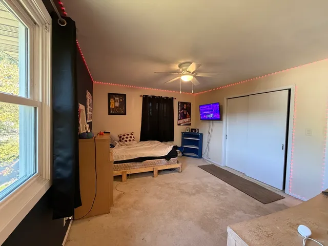 a view of a livingroom with furniture