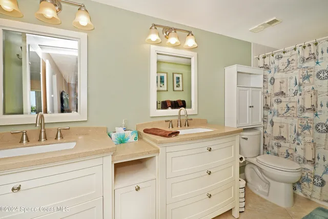 a living room with furniture and windows