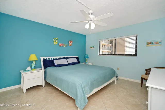 a room with a chair and a window