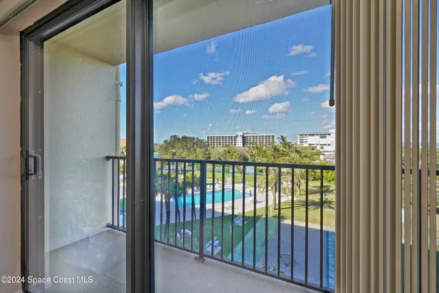 a room with view of kitchen