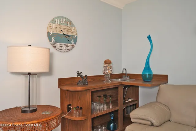 a kitchen with stainless steel appliances a stove refrigerator sink and cabinets