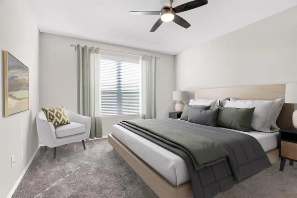 a bedroom with bed and a window