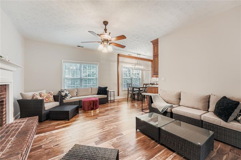 2409 Caneridge Way Southwest Marietta, GA 30064 - Photo 15 of 28 a living room with furniture and a large window