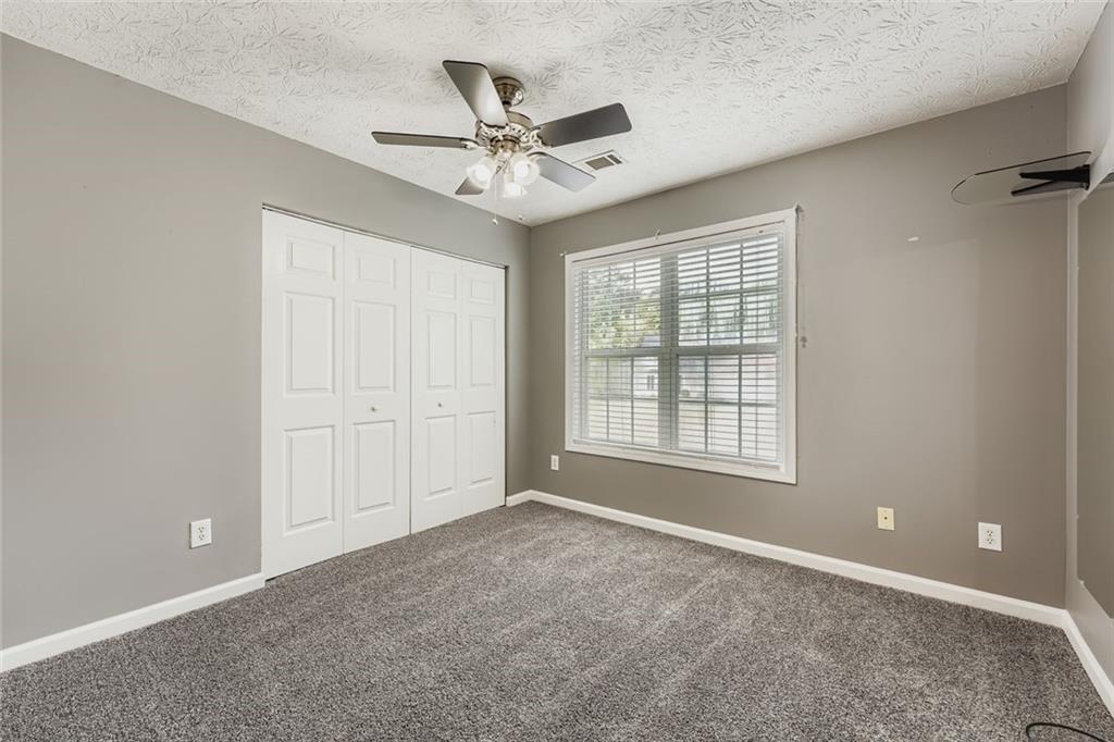 2409 Caneridge Way Southwest Marietta, GA 30064 - Photo 21 of 28 a view of an empty room with a window
