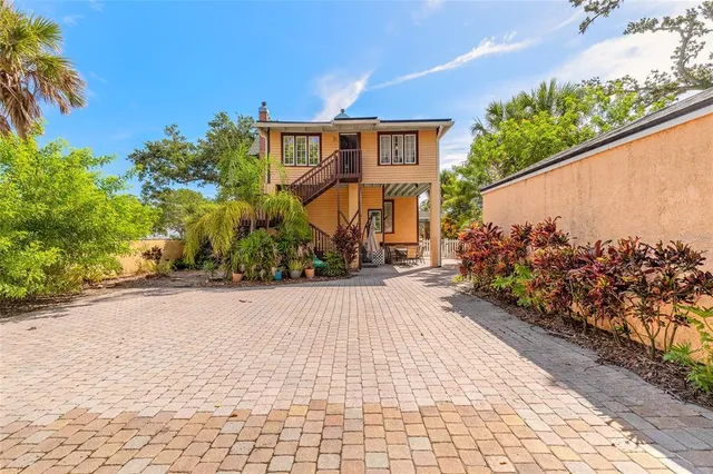 a view of balcony with floor to ceiling window and wooden floor
