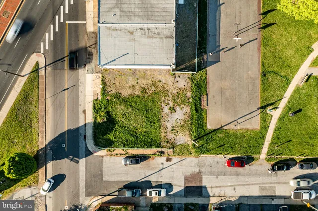 an aerial view of residential building and ocean view