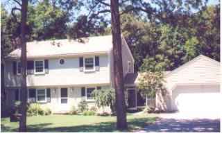 Undisclosed Address Marstons Mills, MA 02648 - Photo 1 of 1 a front view of a house with garden