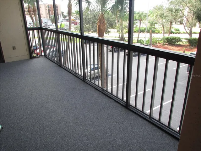 a view of a street from a balcony