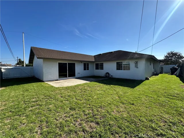 a house view with a garden space