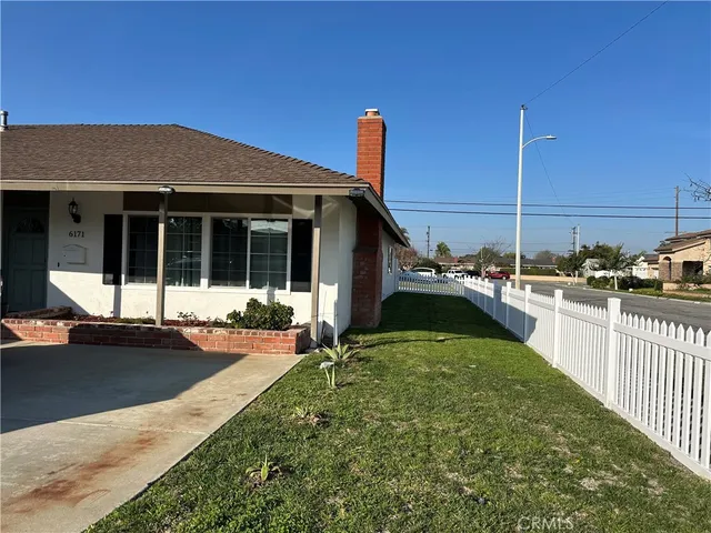 a view of a house with a swimming pool