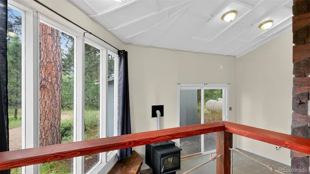 a view of a balcony and front door