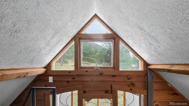 a view of a balcony and furniture