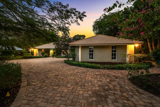 $995,000 | 416 South Country Club Drive, Atlantis, FL 33462