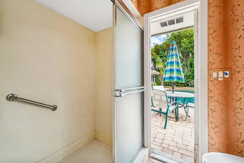 $995,000 | 416 South Country Club Drive, Atlantis, FL 33462