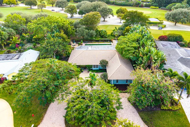 $995,000 | 416 South Country Club Drive, Atlantis, FL 33462