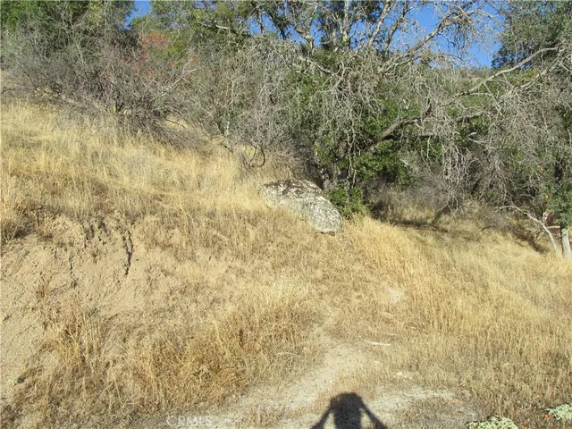 a view of a top of a house with a mountain