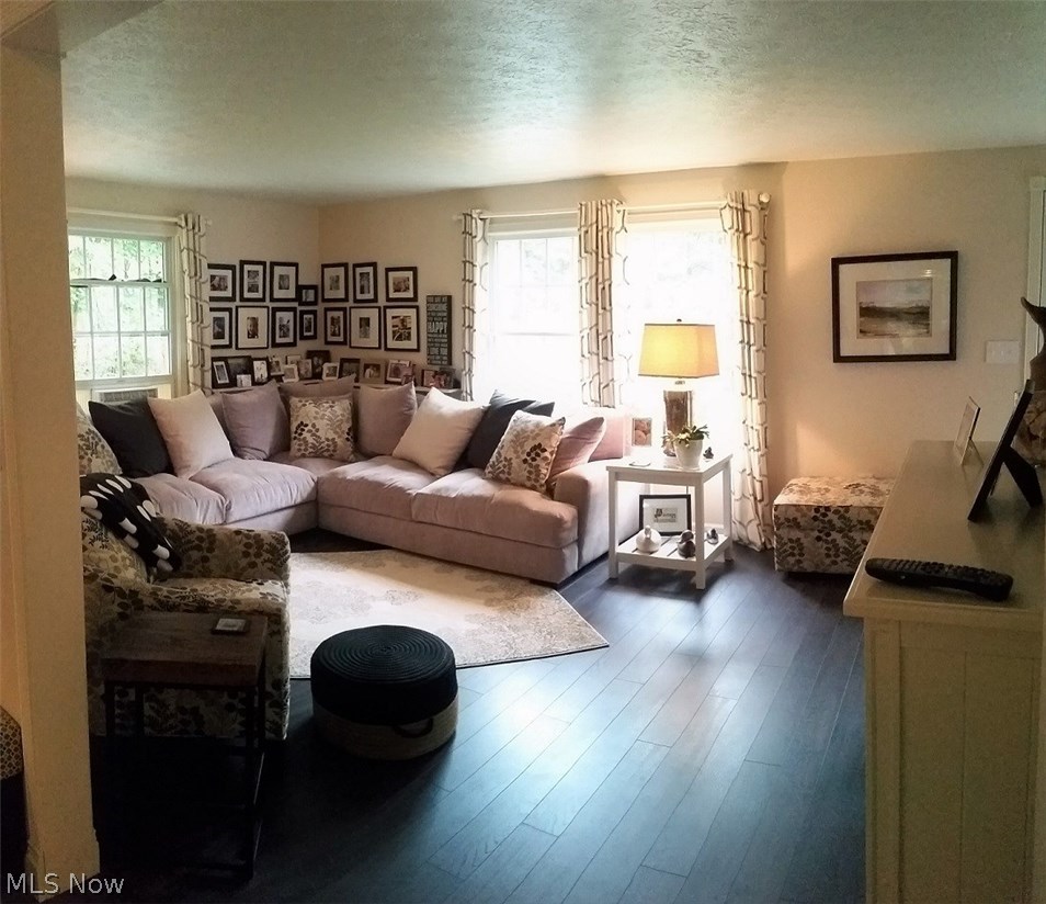 752 Rome Rock Creek Road Roaming Shores, OH 44084 - Photo 2 of 29 This cozy family room gets lots of natural light, it has hard wood floors through out. Make new memories and enjoy this space.